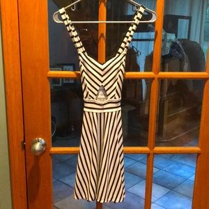 Volcom cut out dress. Size S. White w/ black stripes. Zipper back w/ snaps.